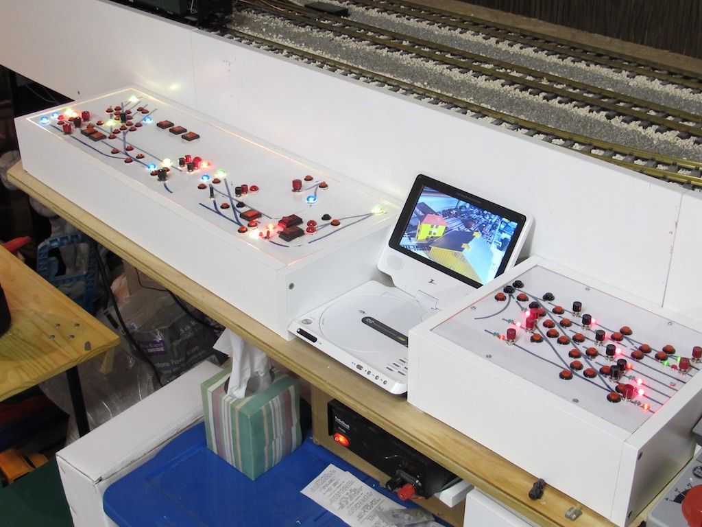 The main control panel. The main yard, 60 feet away, has its own panel but everything is duplicated in this control panel and trains, switches, uncouplers etc can be controlled using the video screen and two cameras.