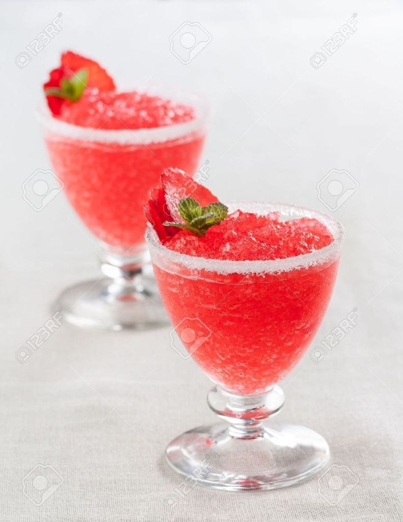 18161547-Strawberry-slushie-cups-decorated-with-mint-on-wooden-table-Stock-Photo_zpswvdpc5ah.jpg