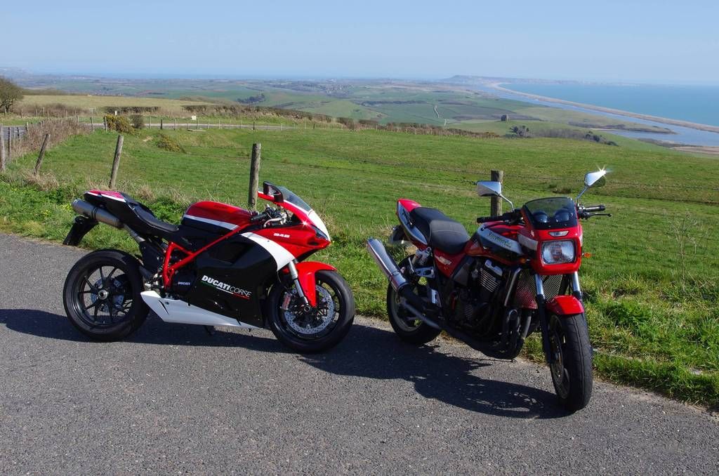Two beautiful bikes completing a beautiful view